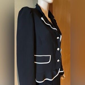 Red Valentino black jacket. Ruffled hem and front with white piping. Italian 48